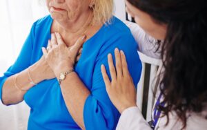 Woman complaining about labored breathing